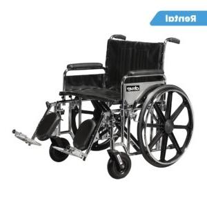 A heavy duty wheelchair with a rental tag.